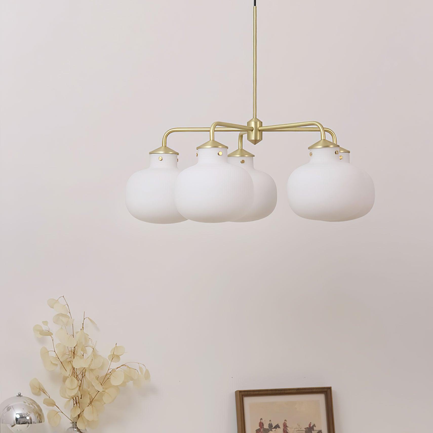Modern Gold Metal and Opal Glass Globe Pendant Light for Contemporary Interiors