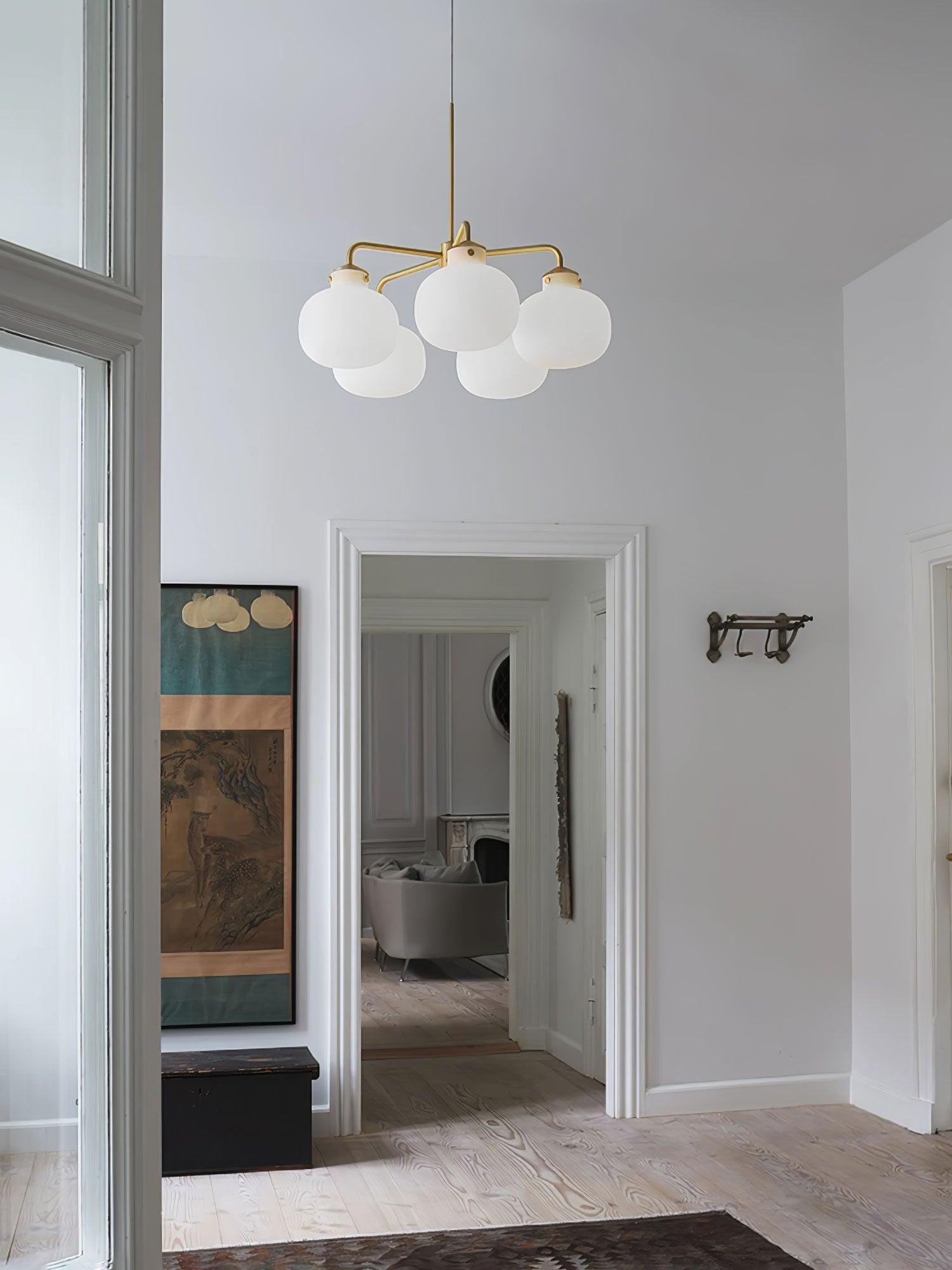 Modern Gold Metal and Opal Glass Globe Pendant Light for Contemporary Interiors
