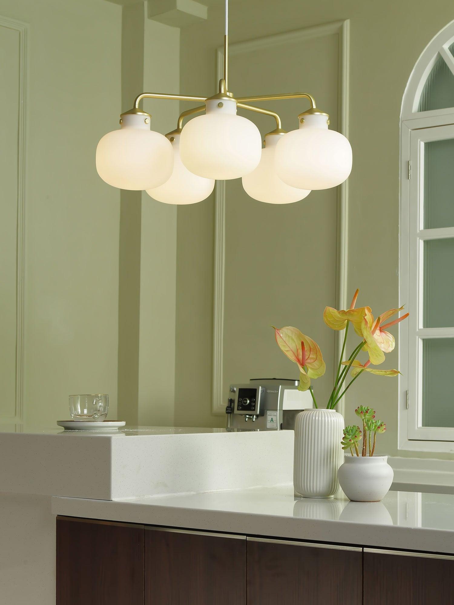 Modern Gold Metal and Opal Glass Globe Pendant Light for Contemporary Interiors