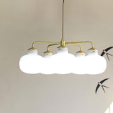 Modern Gold Metal and Opal Glass Globe Pendant Light for Contemporary Interiors