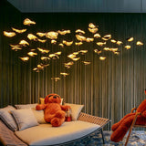 Modern Gold Moon Brass Aviary Constellation LED Chandelier with Metal Shards