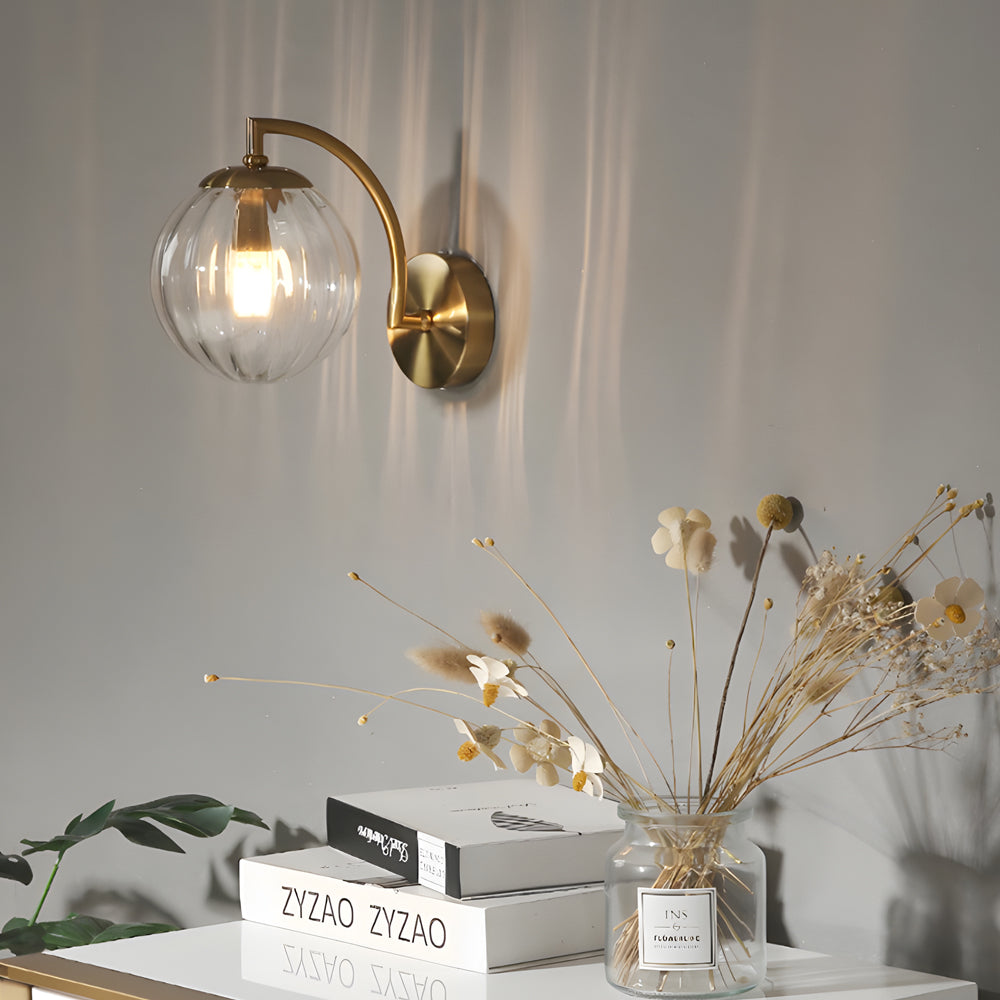 Modern Gold Wall Sconce with Ribbed Glass Globe Shade and Curved Arm Light Fixture