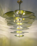 modern-green-textured-glass-leaf-chandelier-with-brass-finish-luxury-lilypad-petal-pendant-light