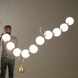 modern-hand-blown-glass-globe-necklace-led-pendant-light-for-living-dining-room