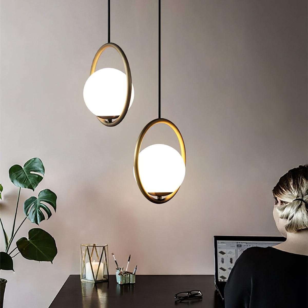modern-hand-blown-glass-sphere-pendant-light-with-brushed-brass-metal-frame-for-elegant-interior-lighting