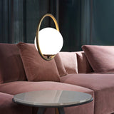 modern-hand-blown-glass-sphere-pendant-light-with-brushed-brass-metal-frame-for-elegant-interior-lighting
