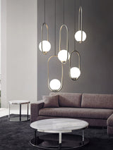 modern-hand-blown-glass-sphere-pendant-light-with-brushed-brass-metal-frame-for-elegant-interior-lighting