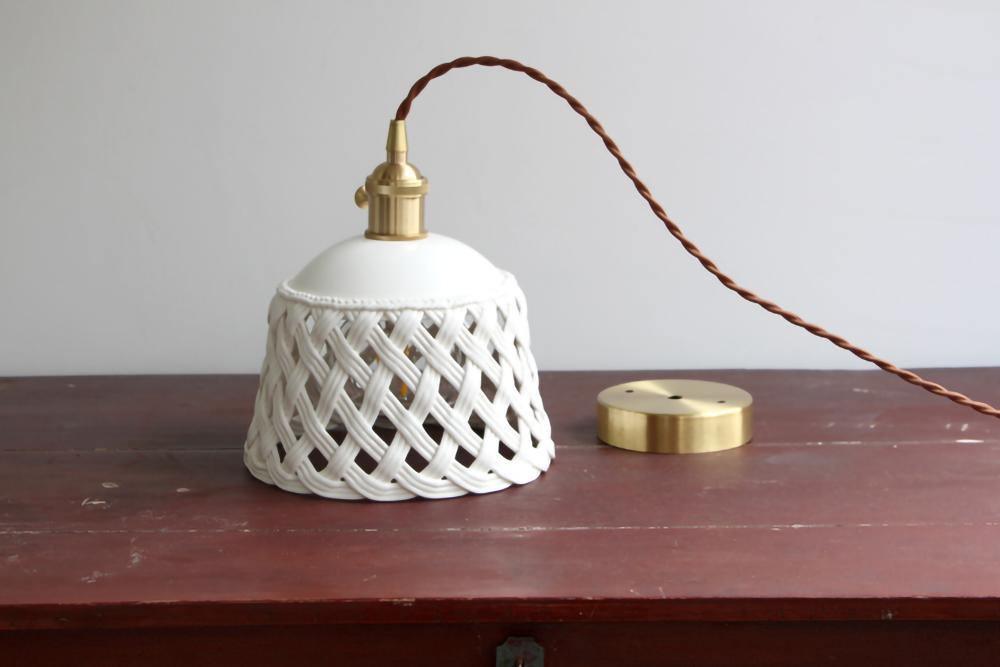 Modern Hand Carved White Ceramic Pendant Lamp with Adjustable Hanging Cord and Brass Finish