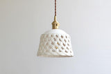 Modern Hand Carved White Ceramic Pendant Lamp with Adjustable Hanging Cord and Brass Finish