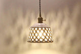 Modern Hand Carved White Ceramic Pendant Lamp with Adjustable Hanging Cord and Brass Finish