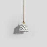 Modern Hand Carved White Ceramic Pendant Lamp with Adjustable Hanging Cord and Brass Finish