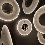 Modern Iris LED Pendant Light with White Fabric Shade and Adjustable Cable for Indoor Lighting