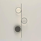 Modern LED Intertwined Ring Wall Sconce Rhythmic Circular Line Lighting Fixture