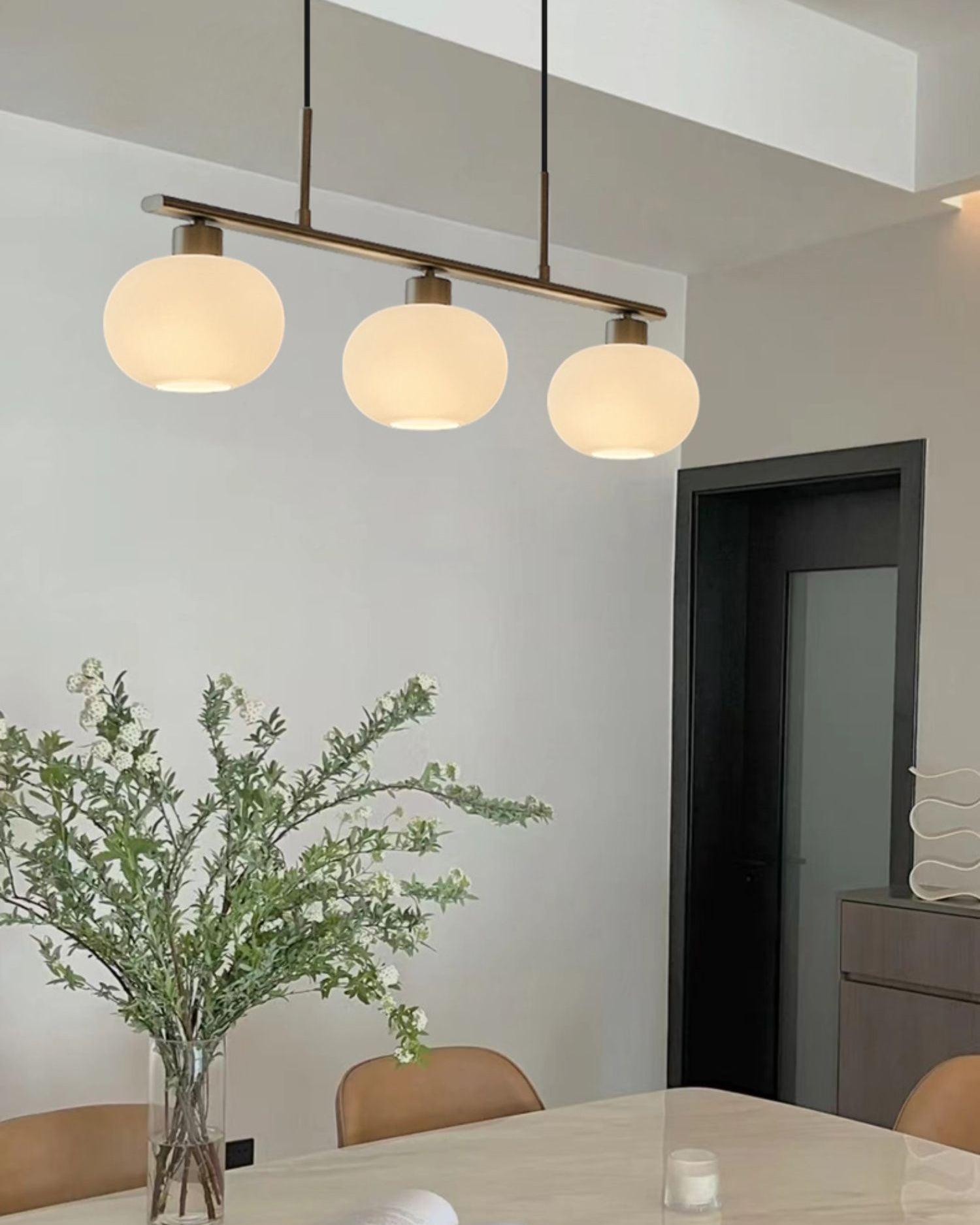 Modern Linear 3 Light Pendant with Globe Glass Shades and Adjustable Height