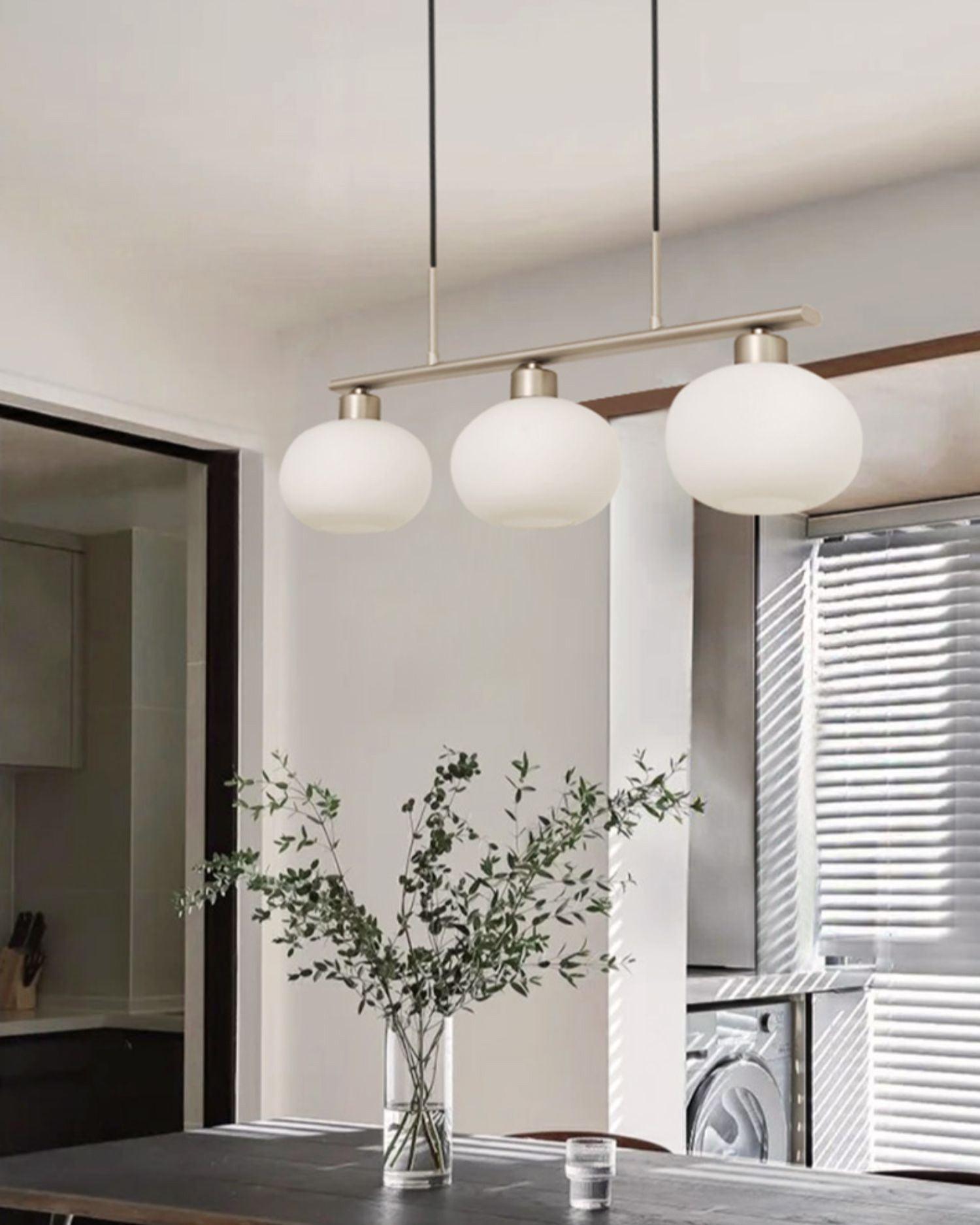 Modern Linear 3 Light Pendant with Globe Glass Shades and Adjustable Height