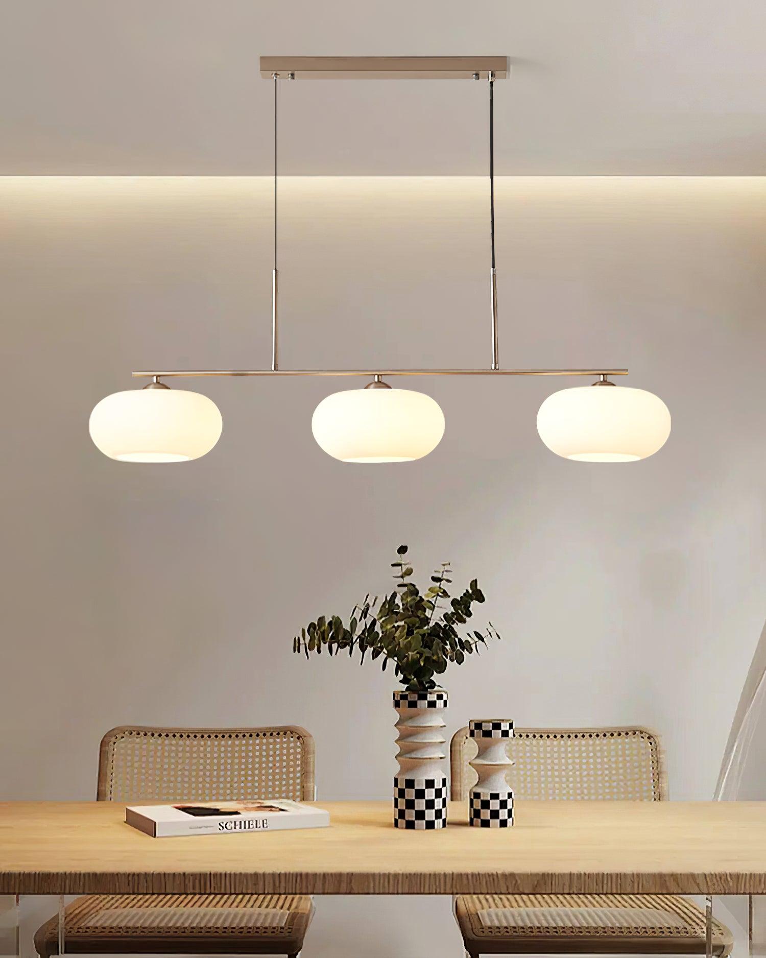 Modern Linear 3 Light Pendant with Globe Glass Shades and Adjustable Height