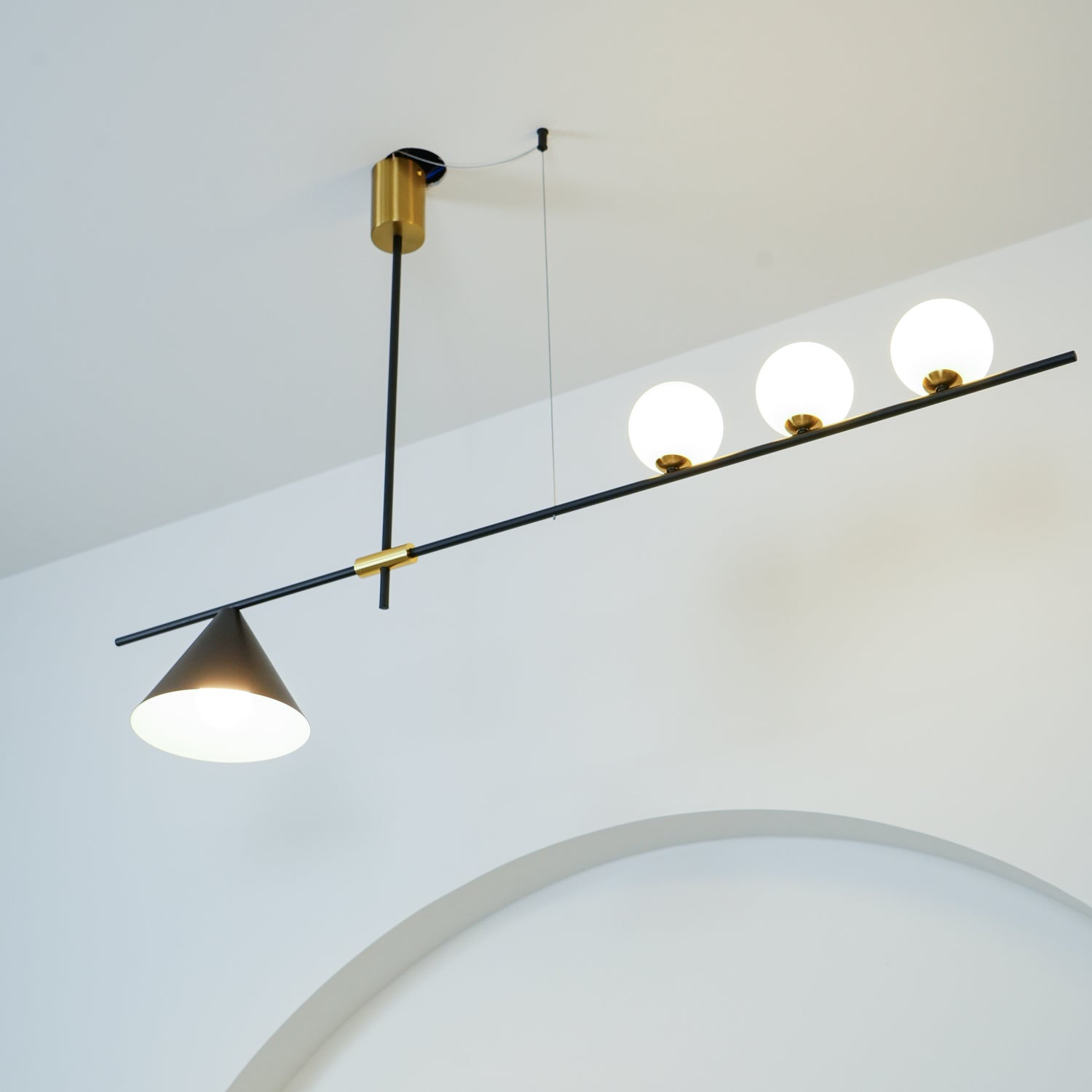 Modern Linear Pendant Chandelier with Opal Glass Globes and Architectural Metallic Design