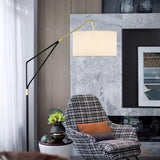 modern-marble-base-floor-lamp-with-oversized-white-linen-shade-and-iron-stand