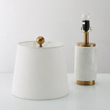 modern-marble-table-lamp-with-elegant-gold-accents-and-white-fabric-shade