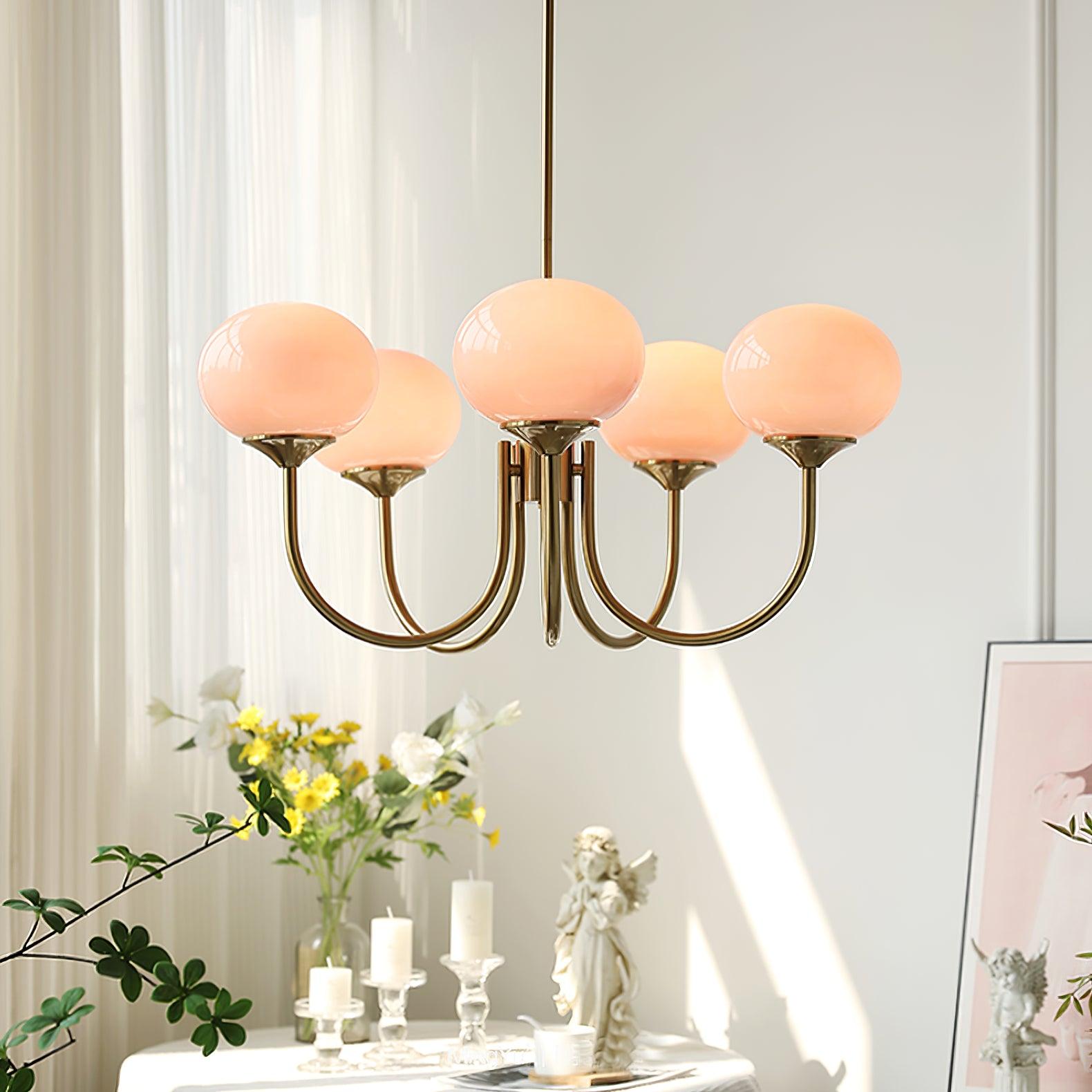 Modern Marshmallow Chandelier with Pink Glass Shades and Gold Finish Lighting