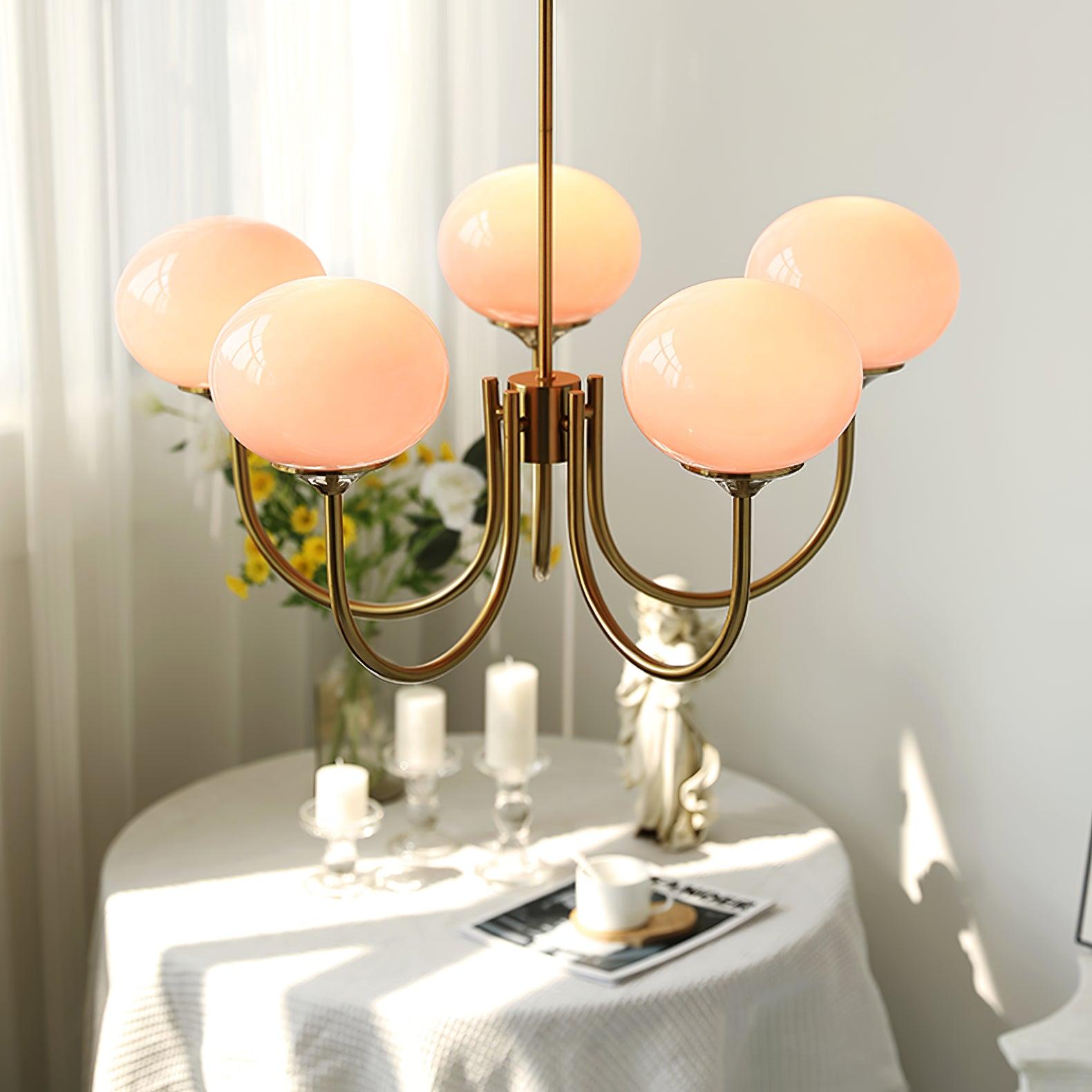 Modern Marshmallow Chandelier with Pink Glass Shades and Gold Finish Lighting