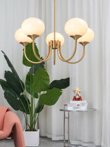 Modern Marshmallow Chandelier with Pink Glass Shades and Gold Finish Lighting