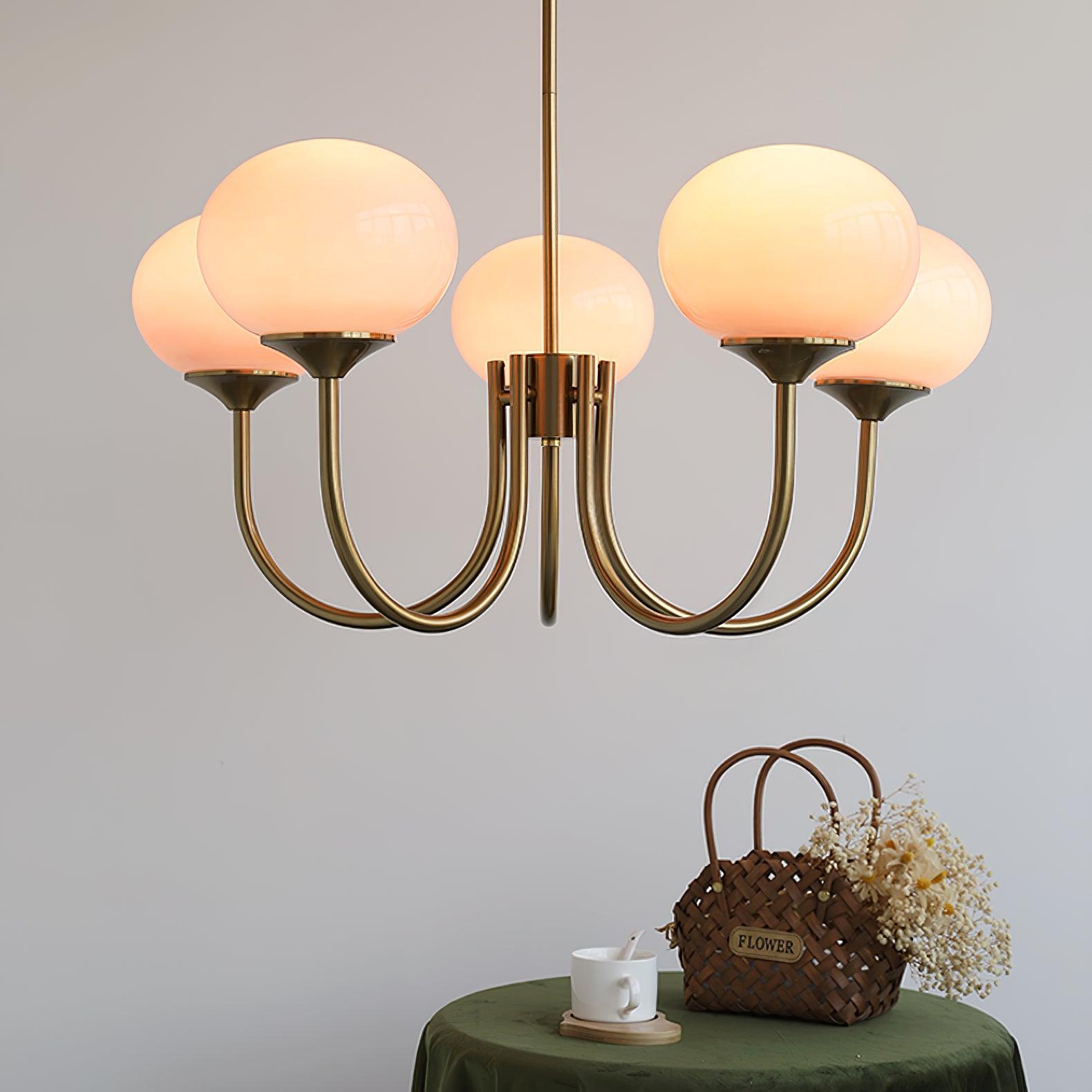 Modern Marshmallow Chandelier with Pink Glass Shades and Gold Finish Lighting