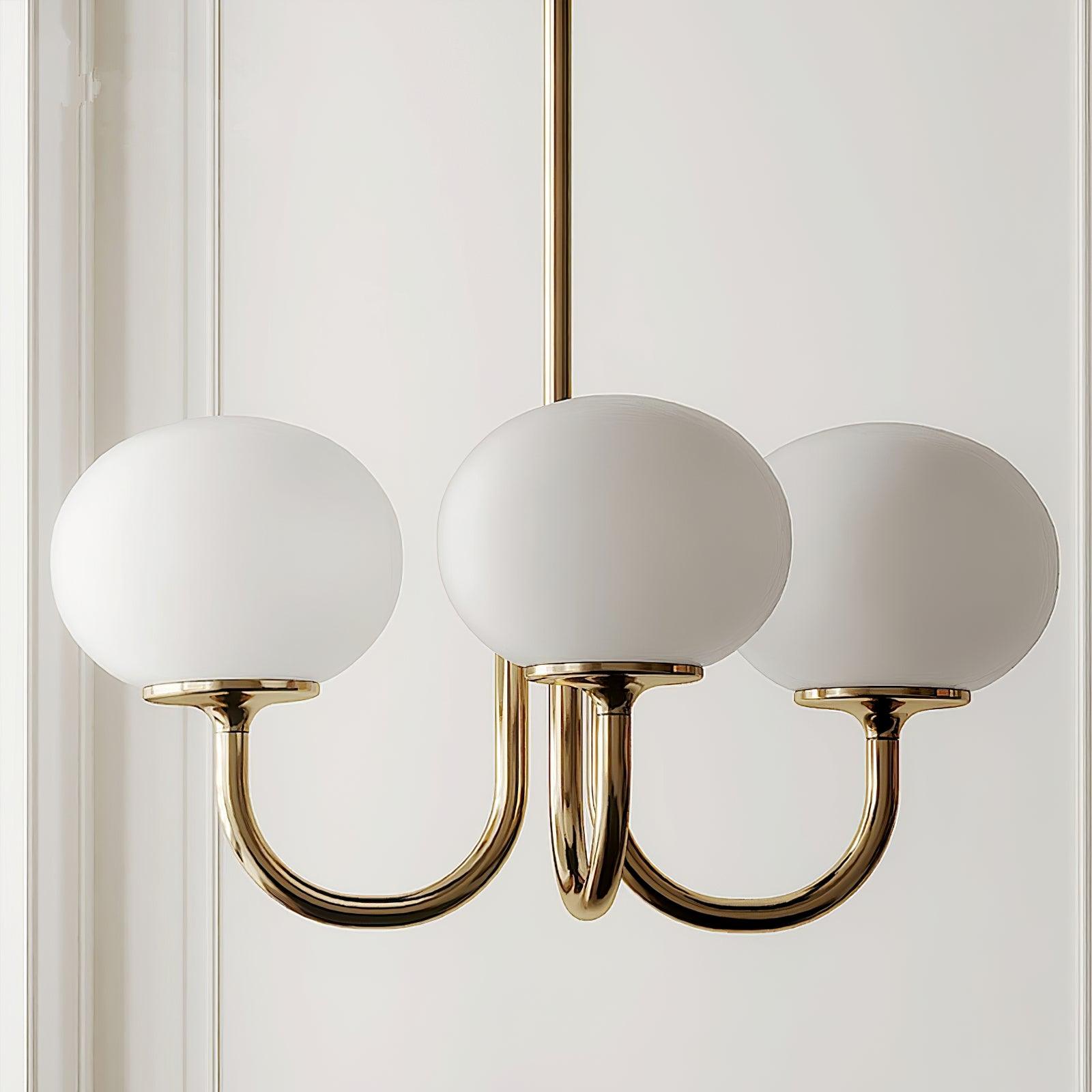 Modern Marshmallow Chandelier with Pink Glass Shades and Gold Finish Lighting