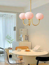 Modern Marshmallow Chandelier with Pink Glass Shades and Gold Finish Lighting