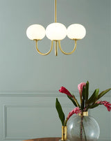 Modern Marshmallow Chandelier with Pink Glass Shades and Gold Finish Lighting