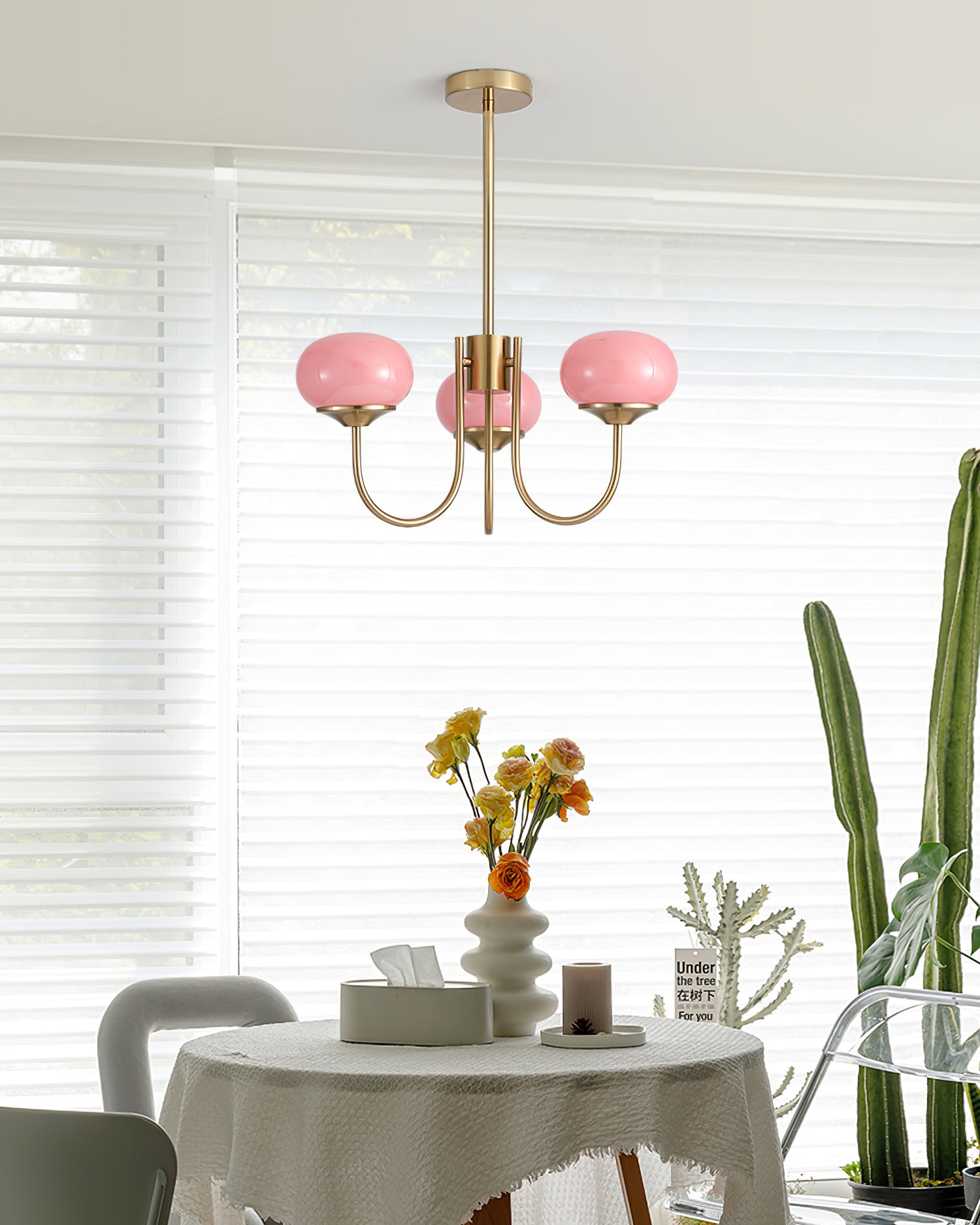 Modern Marshmallow Chandelier with Pink Glass Shades and Gold Finish Lighting
