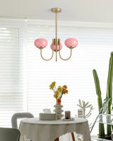 Modern Marshmallow Chandelier with Pink Glass Shades and Gold Finish Lighting