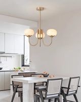 Modern Marshmallow Chandelier with Pink Glass Shades and Gold Finish Lighting