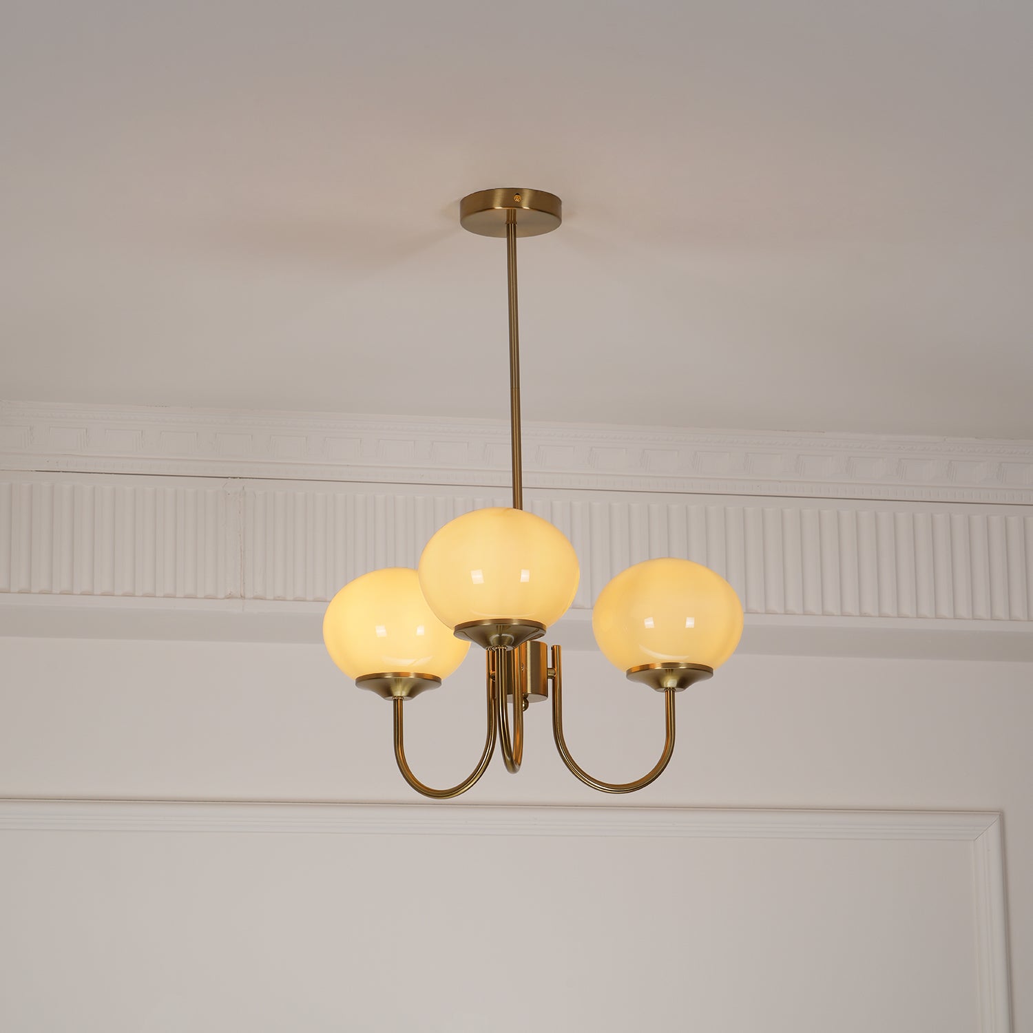 Modern Marshmallow Chandelier with Pink Glass Shades and Gold Finish Lighting