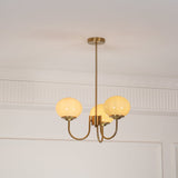 Modern Marshmallow Chandelier with Pink Glass Shades and Gold Finish Lighting