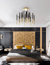Modern Metal Tubular Chandelier with Multi Directional LED Lighting in Black and Gold