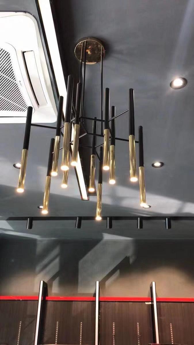 Modern Metal Tubular Chandelier with Multi Directional LED Lighting in Black and Gold