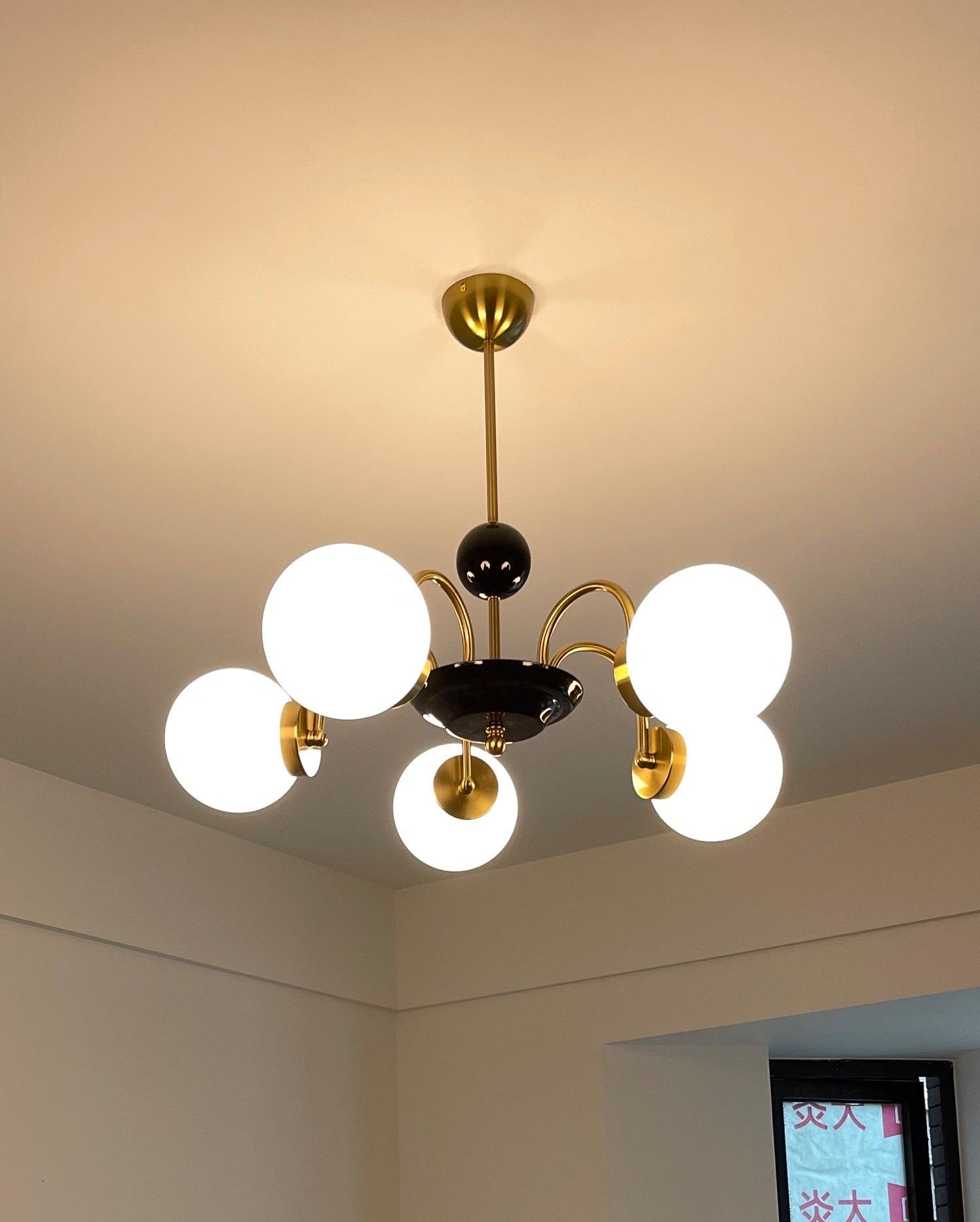 modern-mid-century-glass-globe-chandelier-with-metal-rod-frame-and-white-opal-shades