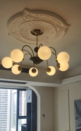 modern-mid-century-glass-globe-chandelier-with-metal-rod-frame-and-white-opal-shades