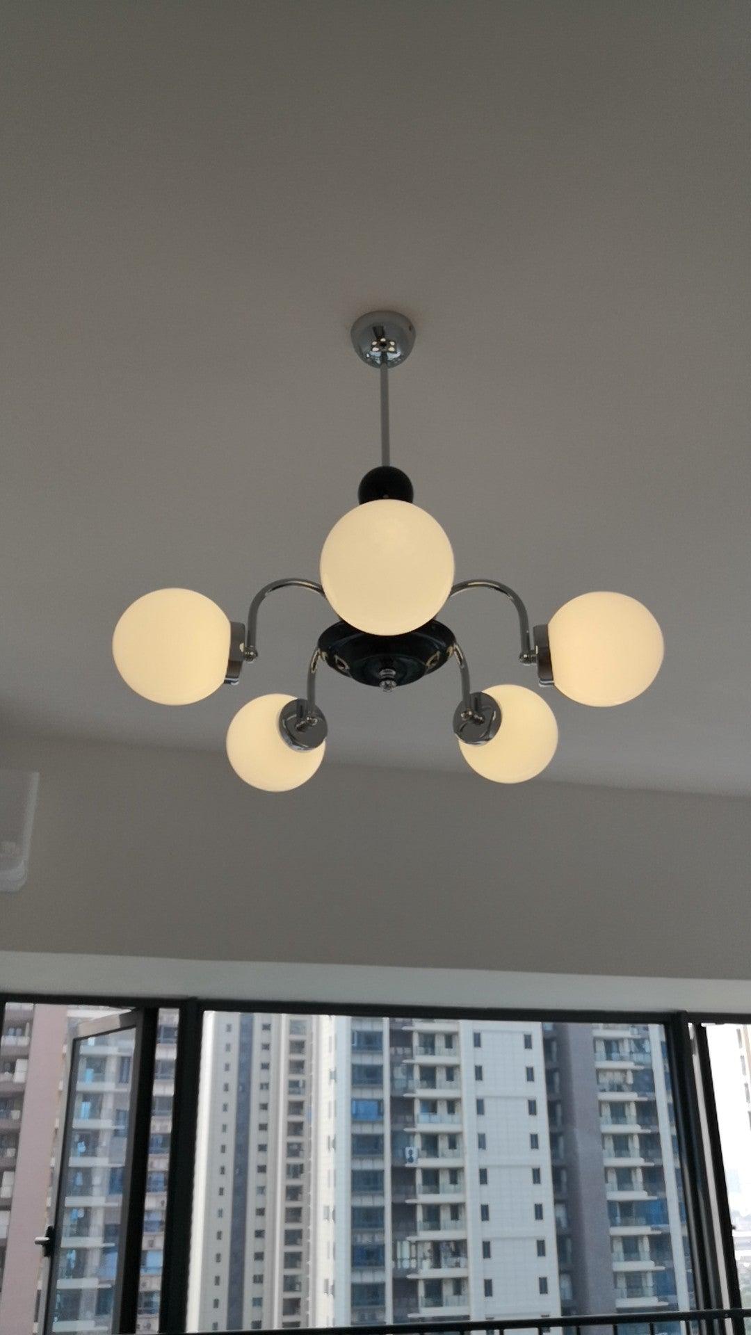modern-mid-century-glass-globe-chandelier-with-metal-rod-frame-and-white-opal-shades
