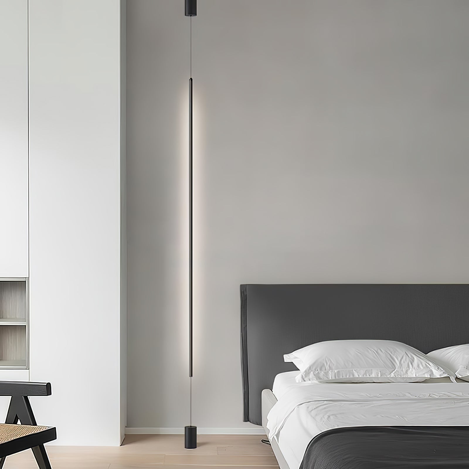 Modern Minimalist Black Slim Vertical LED Pendant Lamp for Contemporary Interiors