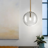 Modern Minimalist Clear Glass Globe Pendant Light with Iron Hardware for Dining Room