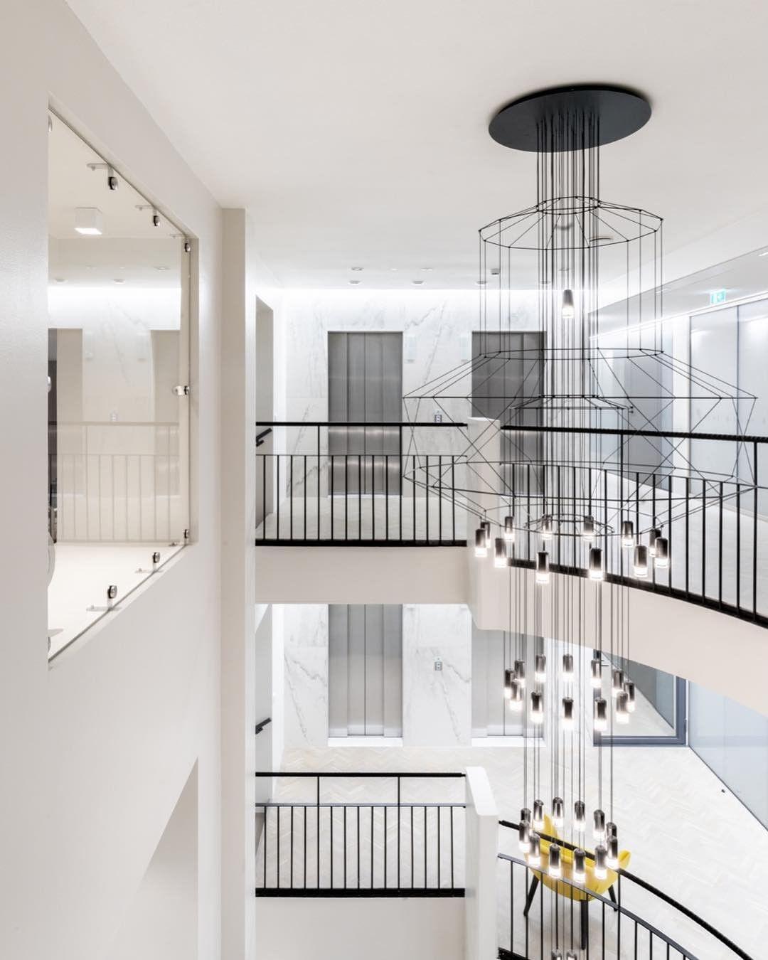 Modern Minimalist Linear LED Chandelier with Multi Head Design