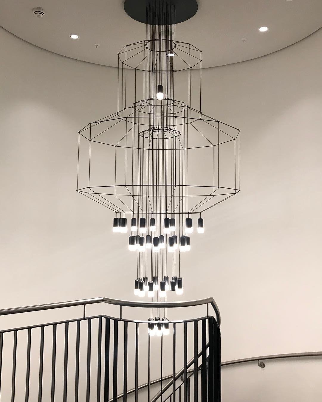 Modern Minimalist Linear LED Chandelier with Multi Head Design