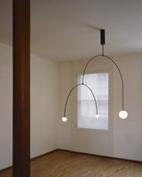 Modern Minimalist Linear Mobile Chandelier with Opal Glass Globes and Black Finish