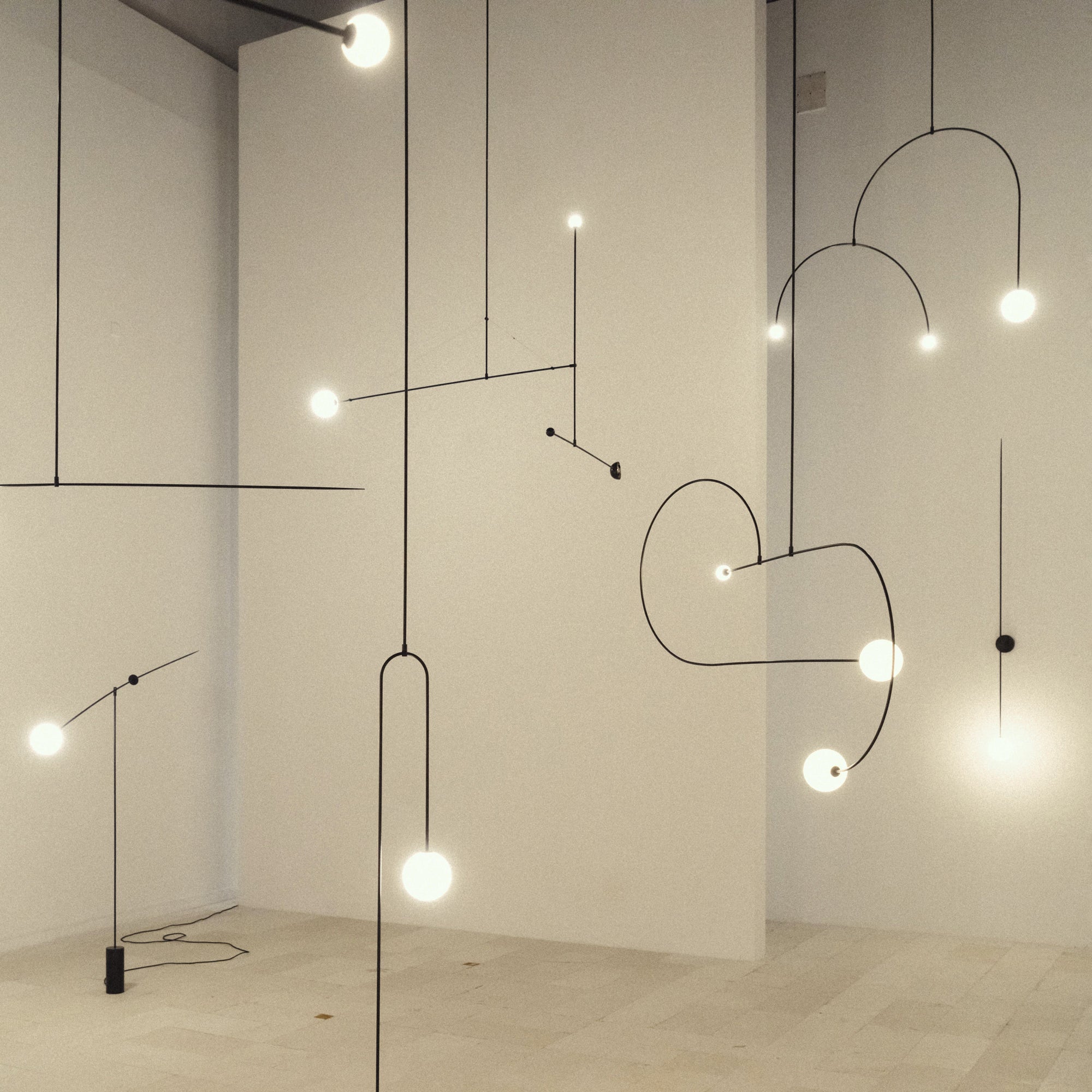 Modern Minimalist Linear Mobile Chandelier with Opal Glass Globes and Black Finish