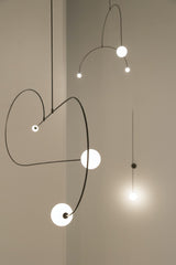 Modern Minimalist Linear Mobile Chandelier with Opal Glass Globes and Black Finish