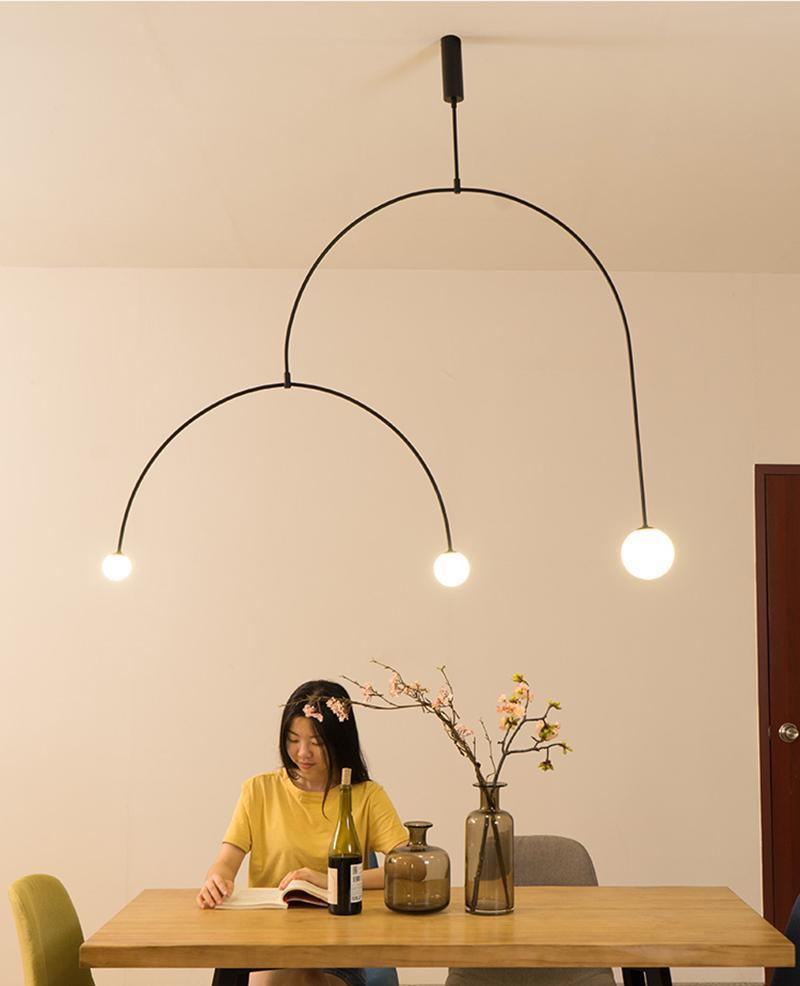 Modern Minimalist Linear Mobile Chandelier with Opal Glass Globes and Black Finish