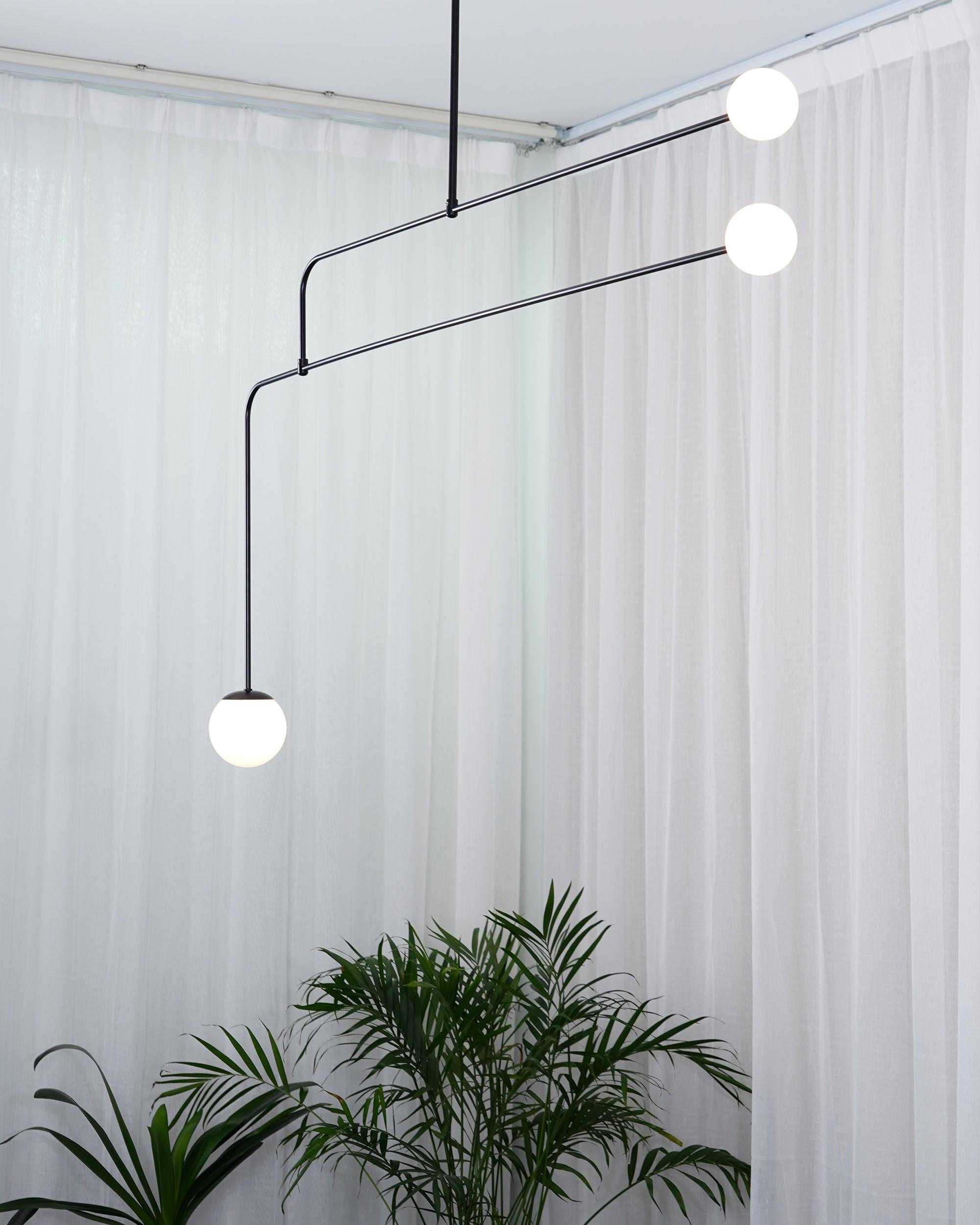 Modern Minimalist Linear Mobile Chandelier with Opal Glass Globes and Black Finish