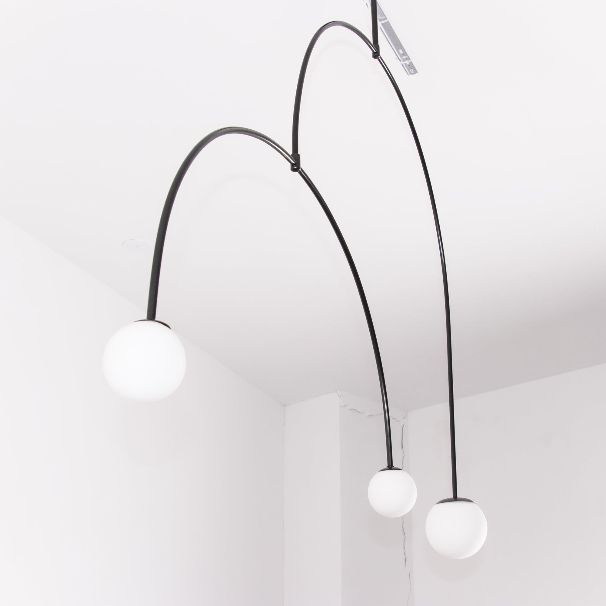 Modern Minimalist Linear Mobile Chandelier with Opal Glass Globes and Black Finish